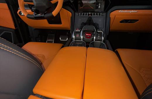 Lamborghini Urus Mansory orange and black rear seats