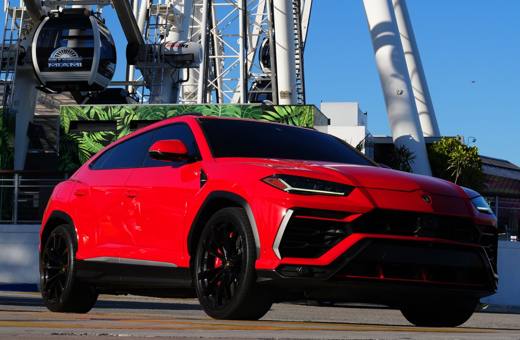 Red Lamborghini Urus, front three-quarter view